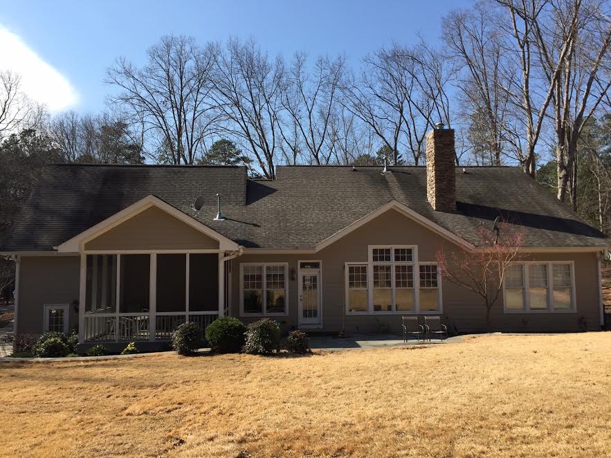 a home before our power washing in Raleigh